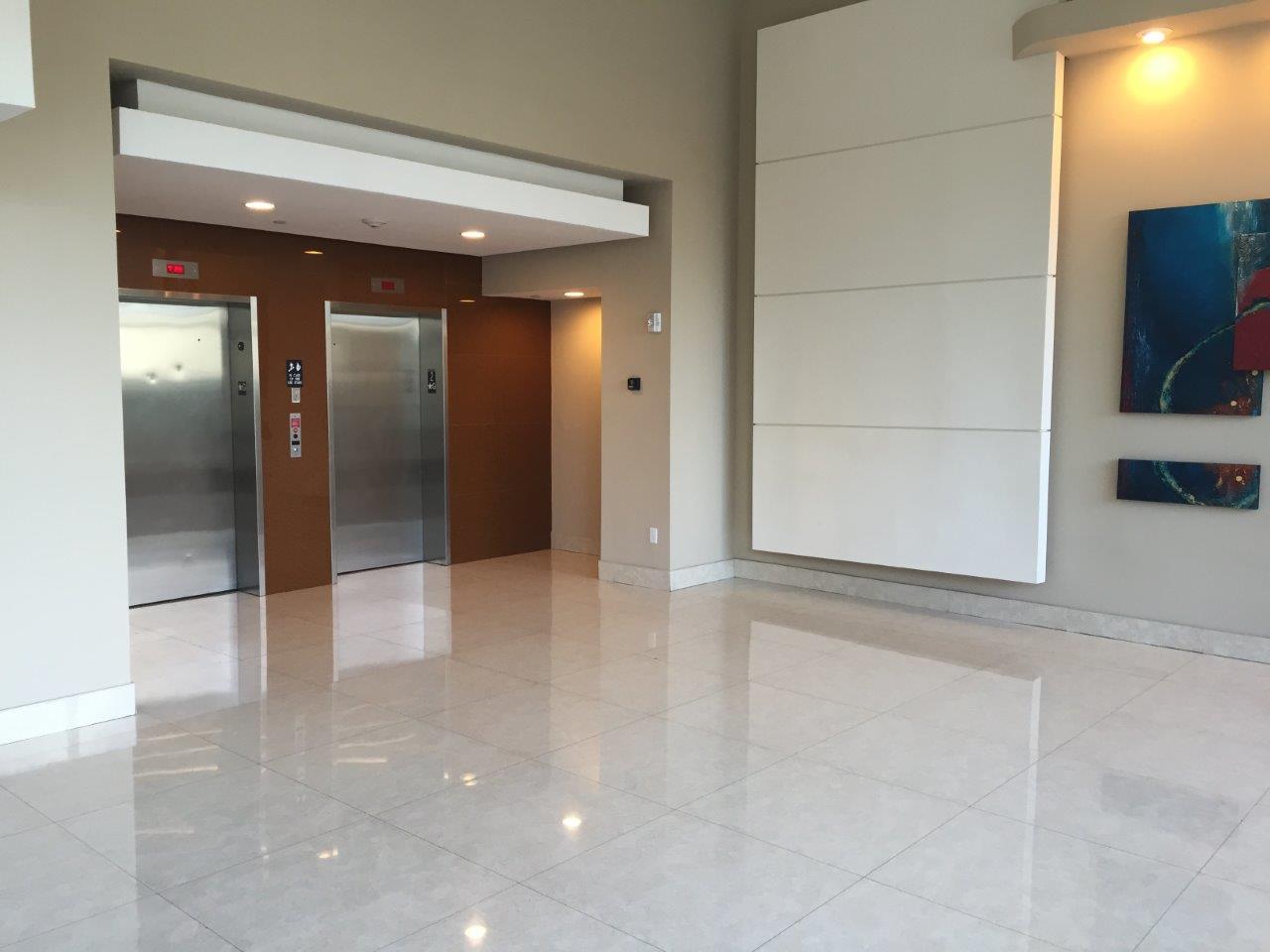 Elevator lobby with wood paneling