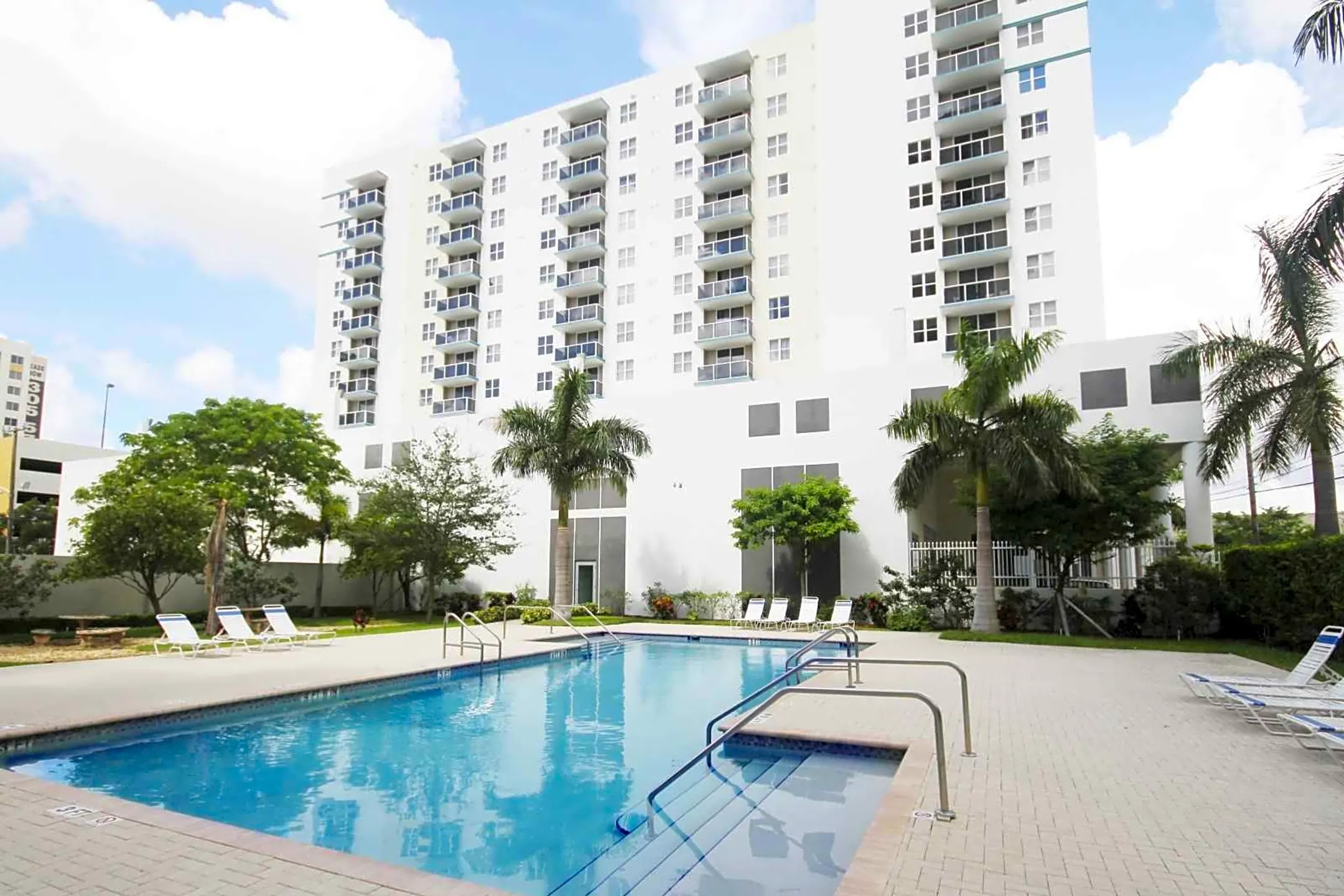 Swimming pool and sun deck at the base of Second Plaza Tower